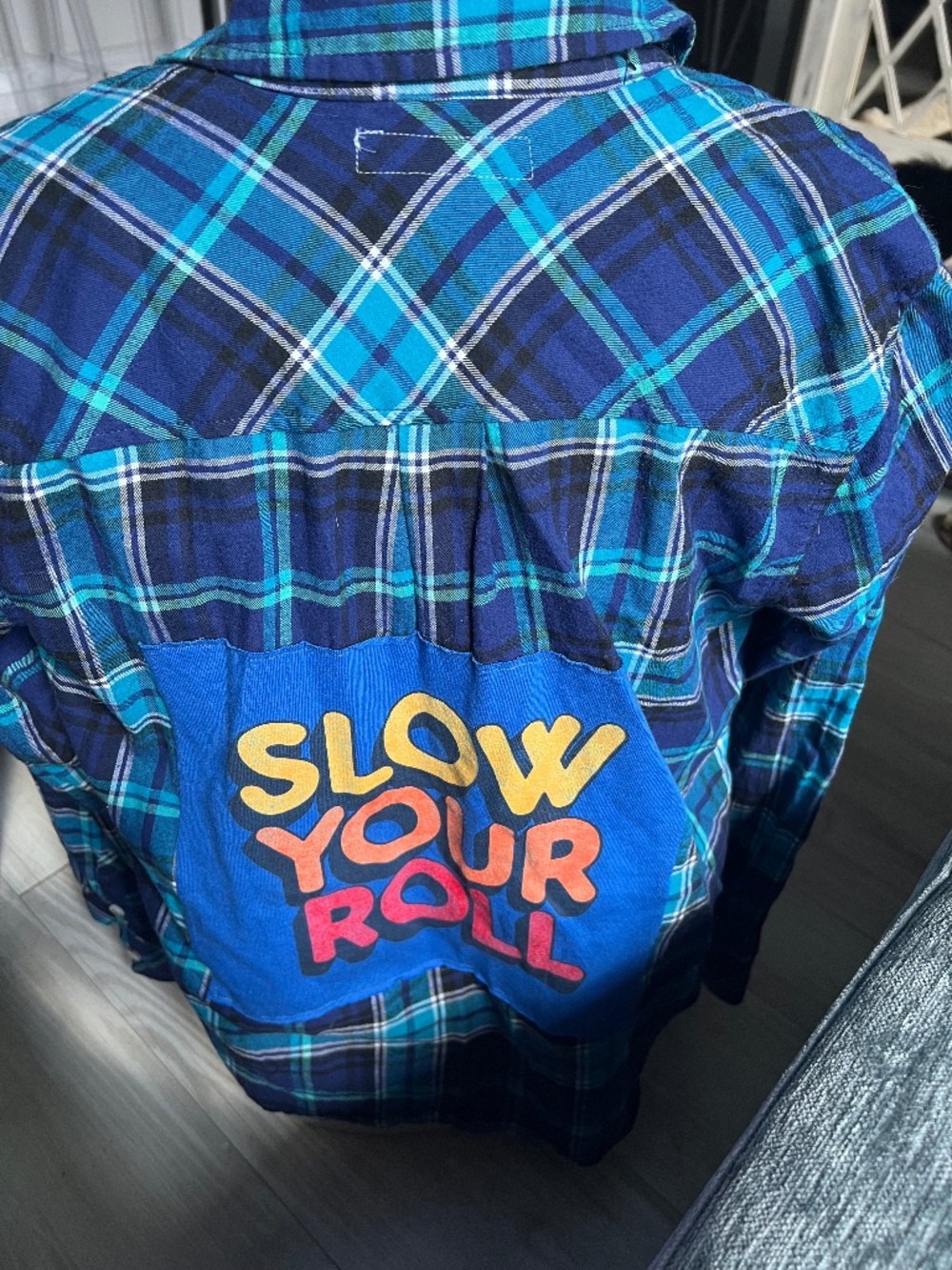 Fun flannel with Slow Your Roll patch on the back petite medium or small